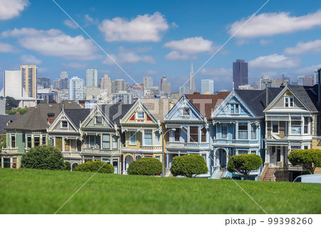 Famous view of  downtown San Francisco at Alamo Square 99398260