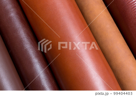 Natural shinny, glossy leather on rools, samples for fashion industry. Natural shinny, glossy leather on rools, samples for fashion industry. 99404403