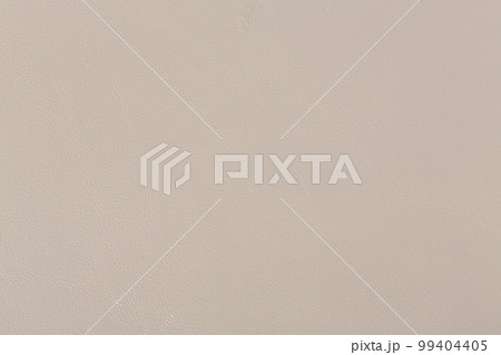 Soft light beige leather texture. Can be used as background in art or design projects. 99404405