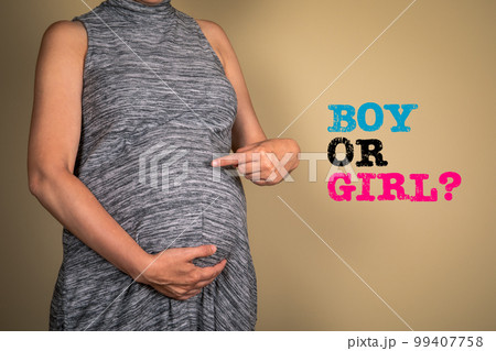 Boy or Girl. Pregnant woman on light background Boy or Girl. Pregnant woman on light background 99407758