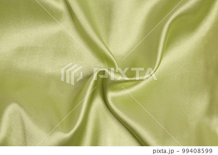 Smooth elegant light green silk or satin luxury fabric texture Top view Smooth elegant light green silk or satin luxury fabric texture Top view 99408599
