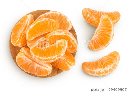 Tangerine or clementine slices in wooden bowl isolated on white background with full depth of field. Top view. Flat lay Tangerine or clementine slices in wooden bowl isolated on white background with full depth of field. Top view. Flat lay 99409907
