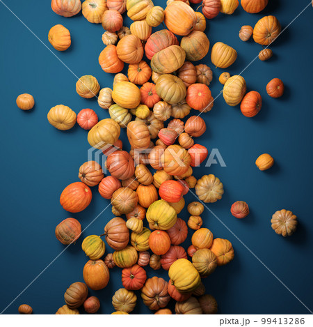 Autumn composition of orange pumpkins on blue table background. 99413286