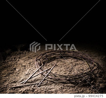 Rusty wreath of thorns at the cross 99414275