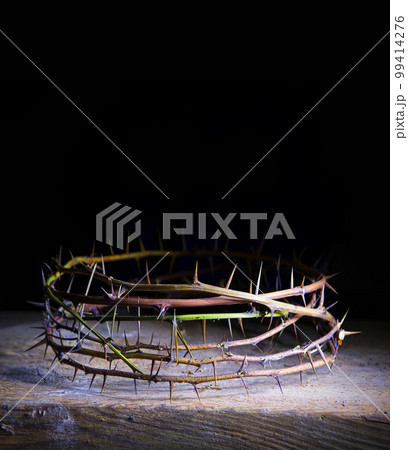 Rusty wreath of thorns at the cross 99414276