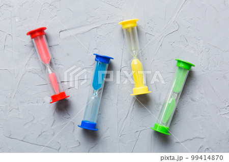 hourglass on the table, sand clock as time passing concept for business deadline, copy space hourglass on the table, sand clock as time passing concept for business deadline, copy space 99414870