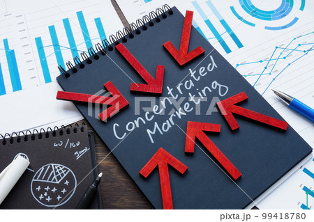 Open notepad with inscription concentrated marketing and arrows. Open notepad with inscription concentrated marketing and arrows. 99418780