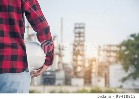 Engineer woman hands holding hardhat white work helmet hard hat for Construction Engineering. Refinery woman engineer oil industry hands hold worker helmet hard hat. Refinery industry engineering Engineer woman hands holding hardhat white work helmet hard hat for Construction Engineering. Refinery woman engineer oil industry hands hold worker helmet hard hat. Refinery industry engineering 99418815