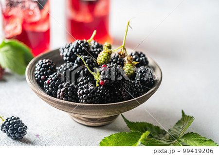 Ripe blackberries with leaves Ripe blackberries with leaves 99419206
