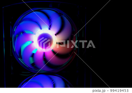 Computer cooler with RGB LED light. Computer circuit board and CPU cooling fans illuminated 99419453