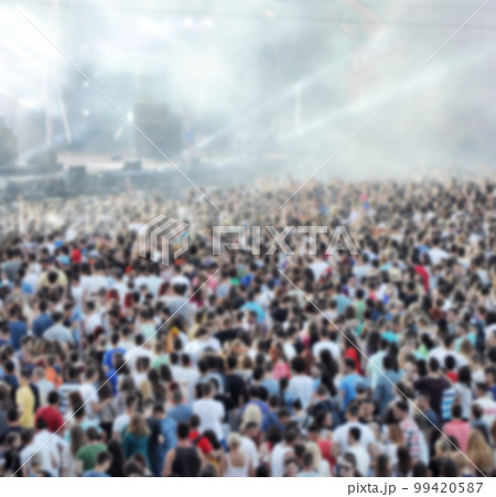 Blurred crowd of people partying Blurred crowd of people partying 99420587