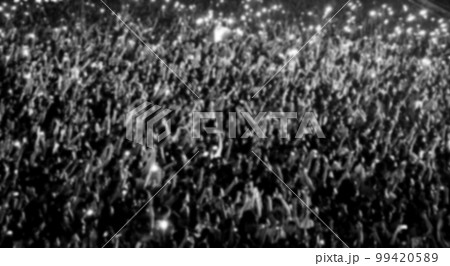 Blurred crowd of people partying Blurred crowd of people partying 99420589