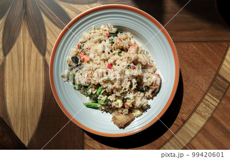 Homemade Holy Basil and Spicy Herb Fried Rice with Shrimps, Squid and Yardlong Bean. 99420601