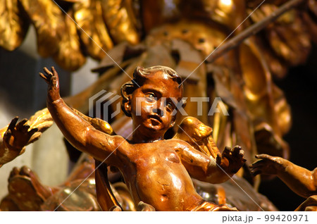 Wooden statue in a catholic church Wooden statue in a catholic church 99420971