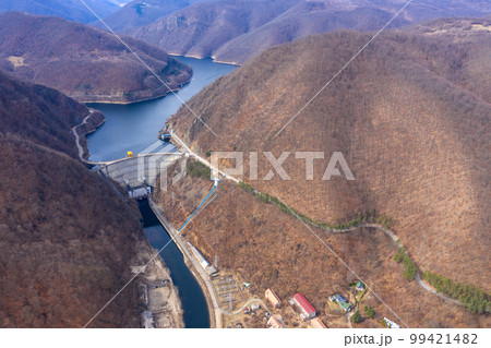 Drone view of a hydroelectric plant and dam 99421482