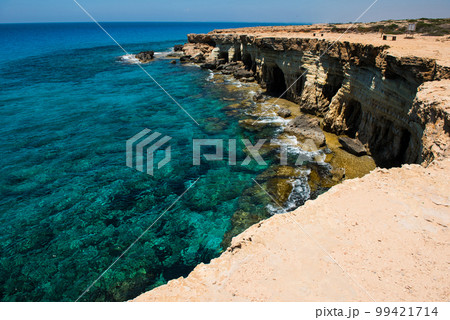 Sea caves near Ayia Napa, Mediterranean sea coast, Cyprus Sea caves near Ayia Napa, Mediterranean sea coast, Cyprus 99421714