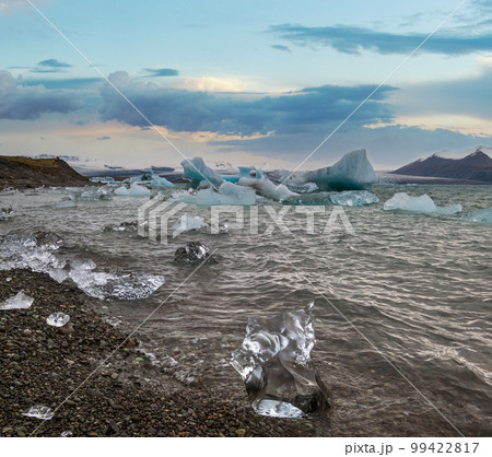 Jokulsarlon glacial lake, lagoon with ice blocks, Iceland. Situated near the edge of the Atlantic Ocean at the head of the Breidamerkurjokull glacier, Vatnajokull icecap or Vatna Glacier. Jokulsarlon glacial lake, lagoon with ice blocks, Iceland. Situated near the edge of the Atlantic Ocean at the head of the Breidamerkurjokull glacier, Vatnajokull icecap or Vatna Glacier. 99422817