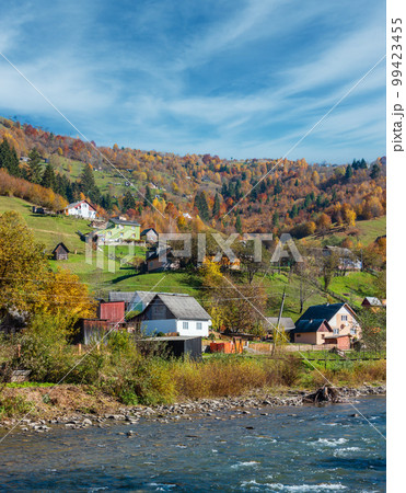 Autumn Carpathian mountain river (Ukraine). 99423455