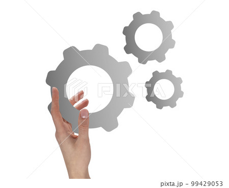 Woman hand holding gear isolated on white background. Strategy, process organization, business idea concept in abstract style. Unity and connection symbol. High quality photo Woman hand holding gear isolated on white background. Strategy, process organization, business idea concept in abstract style. Unity and connection symbol. High quality photo 99429053