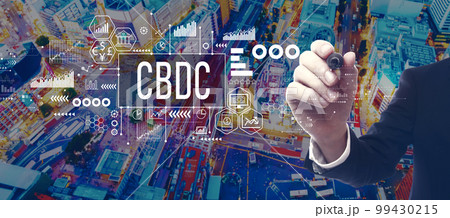 CBDC theme with businessman in city at night 99430215