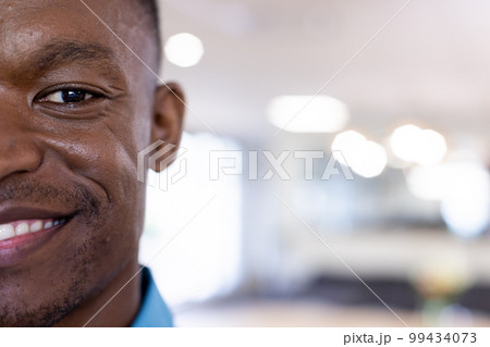 Portrait of happy african american businessman in modern office 99434073