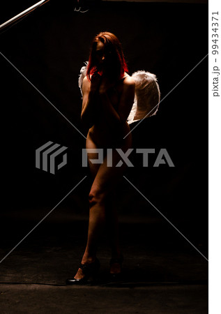 Beautiful Angel with Red Hair Beautiful Angel with Red Hair 99434371
