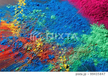 Close up of multi coloured powder with copy space 99435847