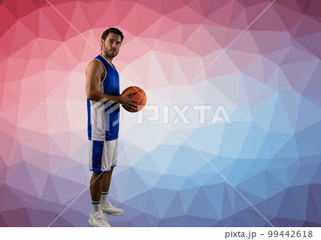 Composition of caucasian male basketball player with ball and copy space on pink background Composition of caucasian male basketball player with ball and copy space on pink background 99442618