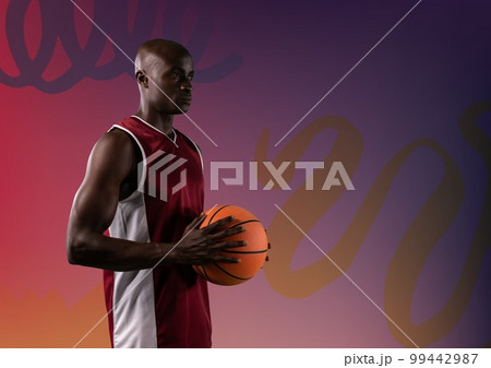 Composition of african american male basketball player with ball and copy space on purple background Composition of african american male basketball player with ball and copy space on purple background 99442987