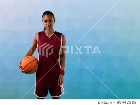 Composition of portrait of female basketball player with ball and copy space on blue background Composition of portrait of female basketball player with ball and copy space on blue background 99442988