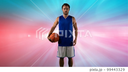 Composition of male basketball player holding basketball with copy space 99443329