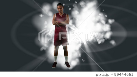 Composition of female basketball player with arms crossed with copy space Composition of female basketball player with arms crossed with copy space 99444663