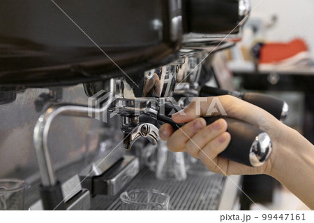 barista brewing, preparing coffee in cafe barista brewing, preparing coffee in cafe 99447161