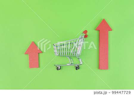 conceptual creative photo of monetary inflation, economic recession, crisis_shopping carts and rising arrows conceptual creative photo of monetary inflation, economic recession, crisis_shopping carts and rising arrows 99447729