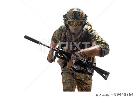 A professional mercenary soldier leaving the kill zone on contact with the enemy. A professional mercenary soldier leaving the kill zone on contact with the enemy. 99448364