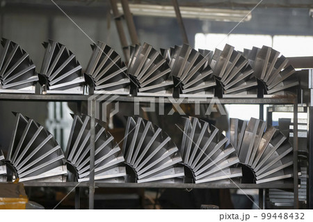 Metal blanks in the shop of a metallurgical plant. Metal blanks in the shop of a metallurgical plant. 99448432
