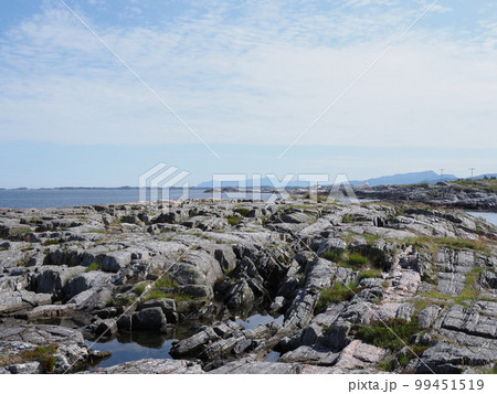 Rocks near Atlantic Ocean Road at Hustadvika town in Norway Rocks near Atlantic Ocean Road at Hustadvika town in Norway 99451519