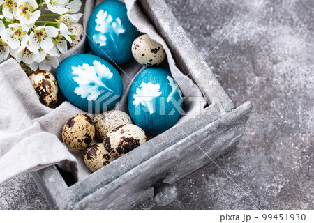 Easter blue eggs painted of natural dye Easter blue eggs painted of natural dye 99451930