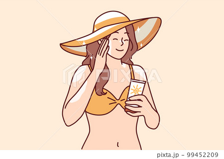 Woman who wants to sunbathe applies sunblock cream to skin to protect herself from sunstroke 99452209