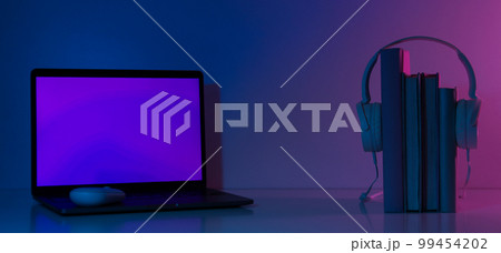 Concept of books vs technology, space for text Concept of books vs technology, space for text 99454202