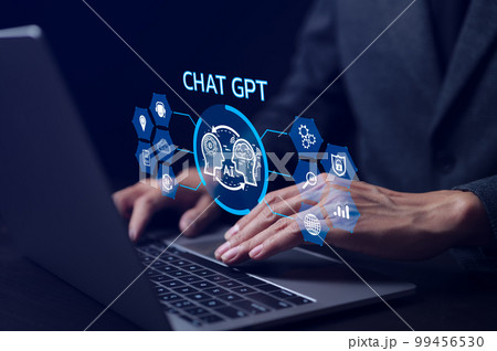 ChatGPT Chat with AI or Artificial Intelligence technology. businessman using a laptop computer chatting with an intelligent artificial intelligence. Developed by OpenAI. Futuristic technology. 99456530
