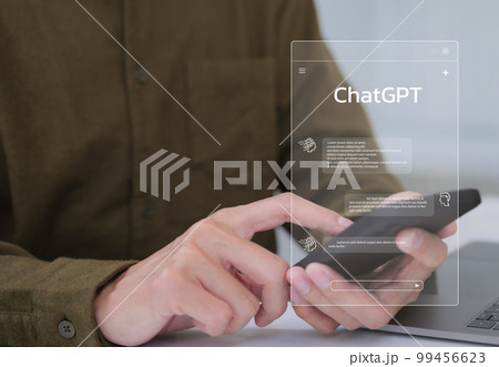 ChatGPT Chat with AI or Artificial Intelligence technology. businessman using smartphone chatting with intelligent artificial intelligence. Developed by OpenAI. Futuristic technology. automate chatbot 99456623