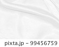white silk textured cloth background,Closeup of rippled satin fabric with soft waves. 99456759