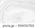 white silk textured cloth background,Closeup of rippled satin fabric with soft waves. 99456760