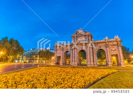 Madrid Spain, night city skyline at Puerta de Alcala 99458585