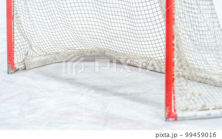 detail of a hockey goal on the ice 99459016