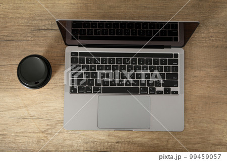 Concept of workspace with laptop, top view Concept of workspace with laptop, top view 99459057