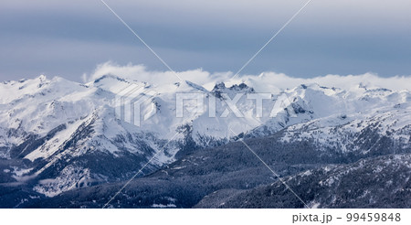 Snow and Cloud covered Canadian Nature Landscape Background. Winter Season in Whistler 99459848