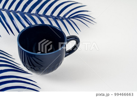 Simple ceramic blue crockery on kitchen counter Simple ceramic blue crockery on kitchen counter 99466663