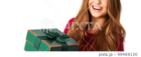 Birthday, Christmas or holiday present, happy woman holding a green gift or luxury beauty box subscription delivery isolated on white background, portrait 99469130